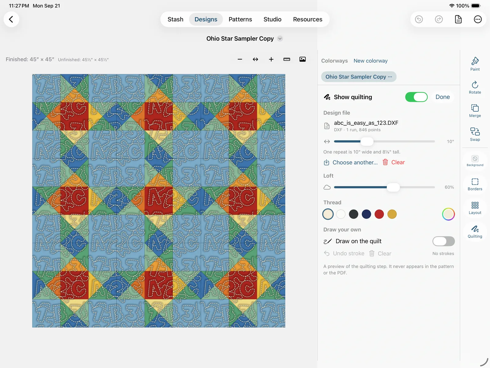 A longarm design file tiled across the quilt