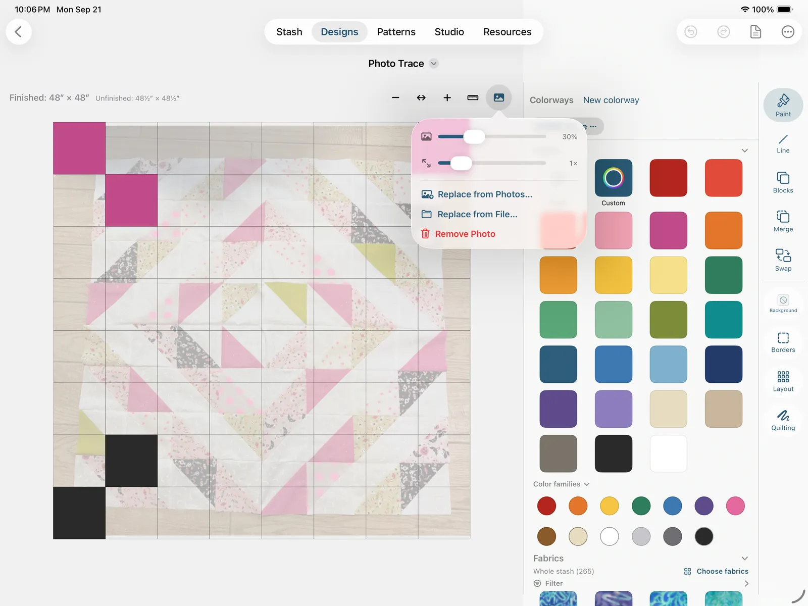 The reference photo popover over a block quilt